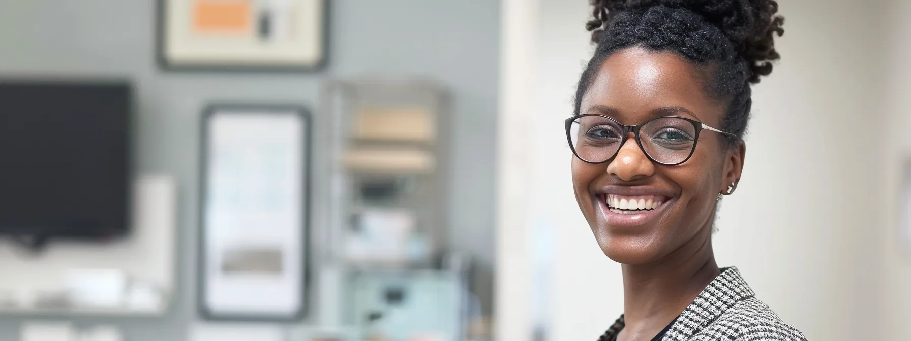 a smiling patient standing tall and pain-free after receiving chiropractic care in atlanta.