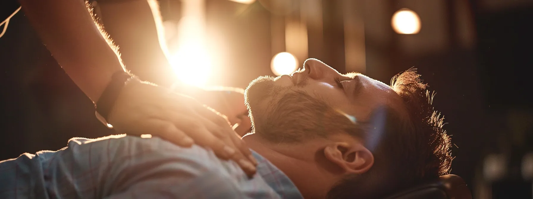 a person receiving a chiropractic adjustment, with the chiropractor focused on improving spinal alignment for enhanced health and mobility.