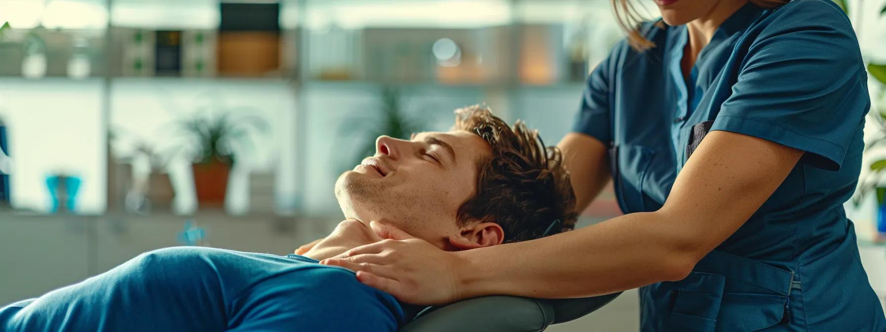 a chiropractor using active release techniques on an athlete's neck to target specific tissue problems in a modern clinic setting.